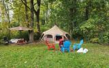 The Glamping tent is located at the bottom of the hill